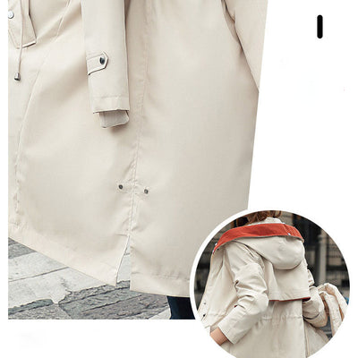 Clara – Elegante Winterjacke mit Kapuze und Kunstpelzkragen